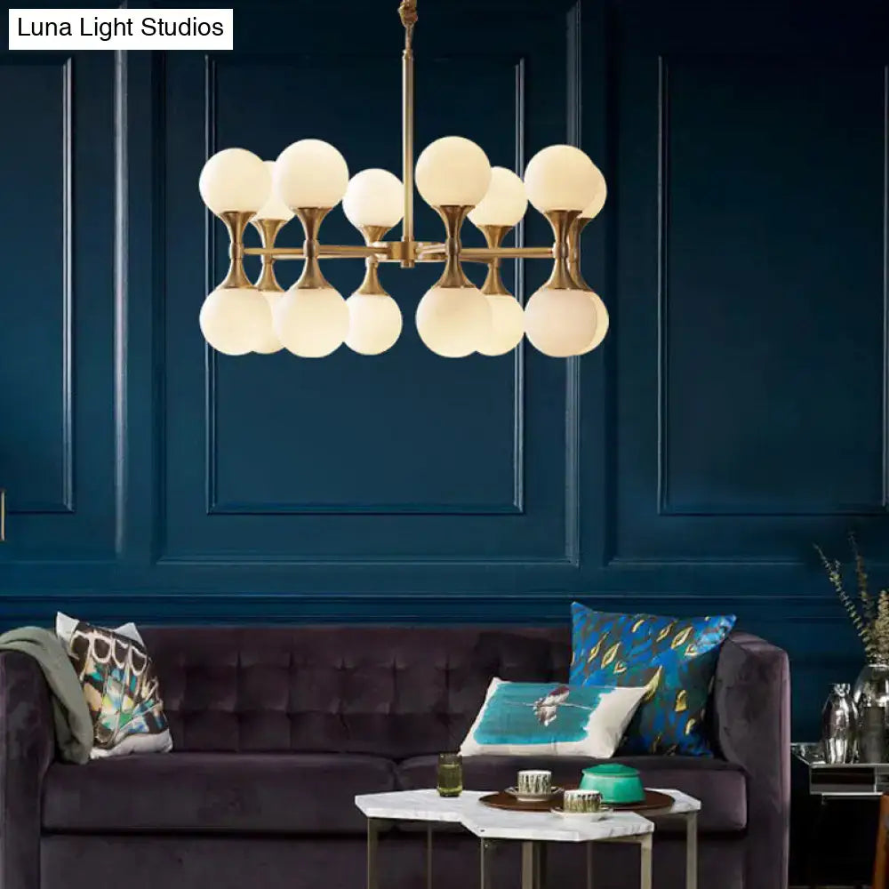 Brass-finished DecorBites™ opal glass chandelier light with 12 frosted globe heads for postmodern ceiling hanging
