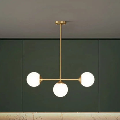 Gold-toned decorbites opaline glass ball pendant light with three frosted bulbs for minimalist dining room island
