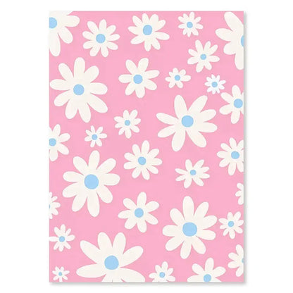 DecorBites™ pastel purple smiley flower canvas wall art with pink floral notebook cover featuring white daisies and blue centers