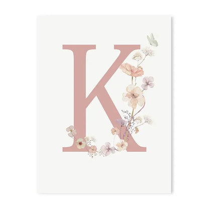 Decorbites™ personalized pink floral nursery wall art featuring a delicate pink letter k with flowers on white paper