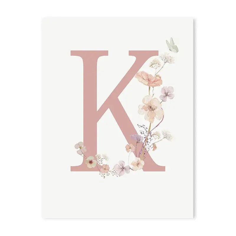 Decorbites™ personalized pink floral nursery wall art featuring a delicate pink letter k with flowers on white paper