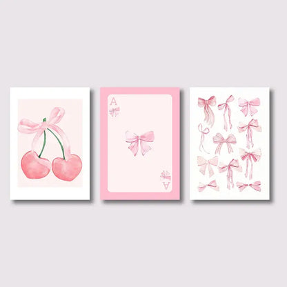 DecorBites™ pink bows wall art set features three watercolor-style prints with pink bows on a soft pastel background