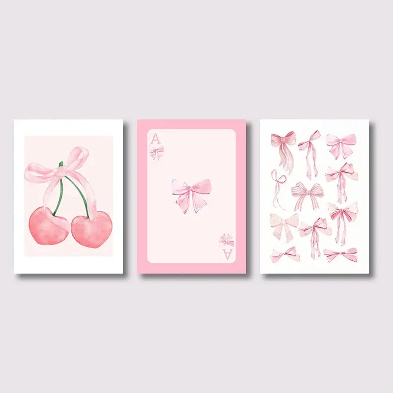 DecorBites™ pink bows wall art set features three watercolor-style prints with pink bows on a soft pastel background