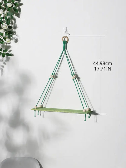 Green wooden macrame wall shelf with wooden beads and natural wood ring for kids room by DecorBites pink green
