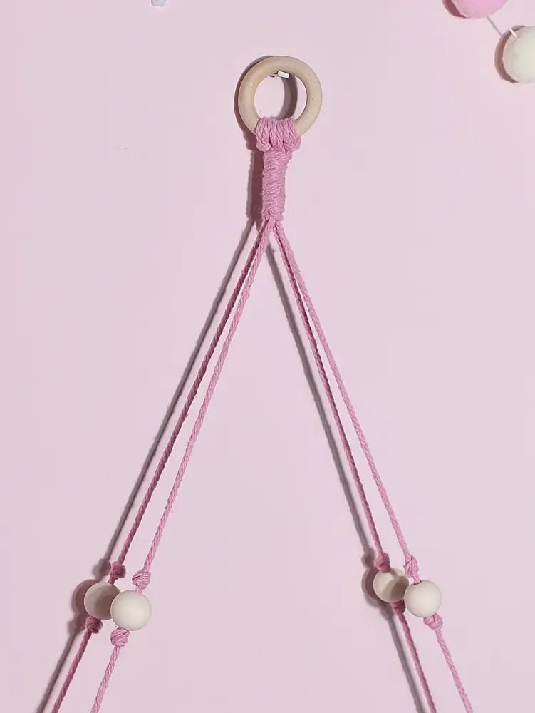 Pink macrame plant hanger with wooden ring and white beads for decorbites pink green wooden kids room shelf