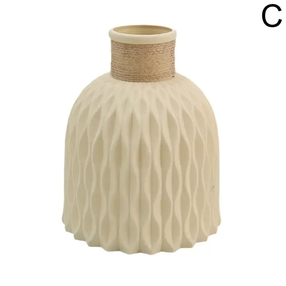 Cream-colored ceramic DecorBites plastic vase with wavy texture and natural twine band for flower arrangement