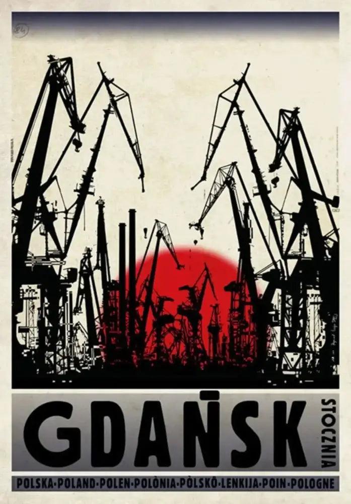 Black silhouette of industrial cranes against red sun on beige sky poland city vintage canvas prints by DecorBites™