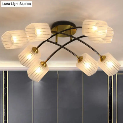DecorBites™ post modern brass semi-flush mount ceiling light with six cream striped frosted glass shades on black arms