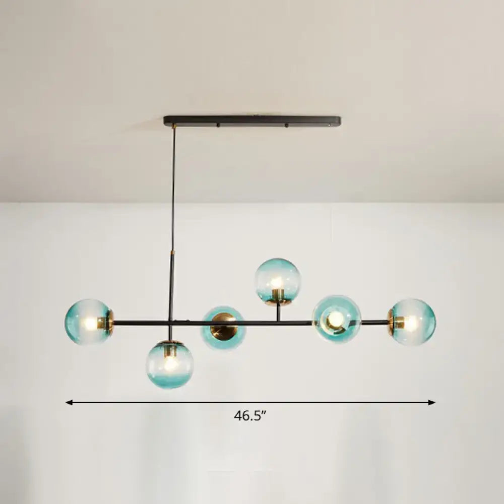 Modern teal glass globe pendant light with black metal frame and brass accents in decorbites postmodern island lamp blue white gold