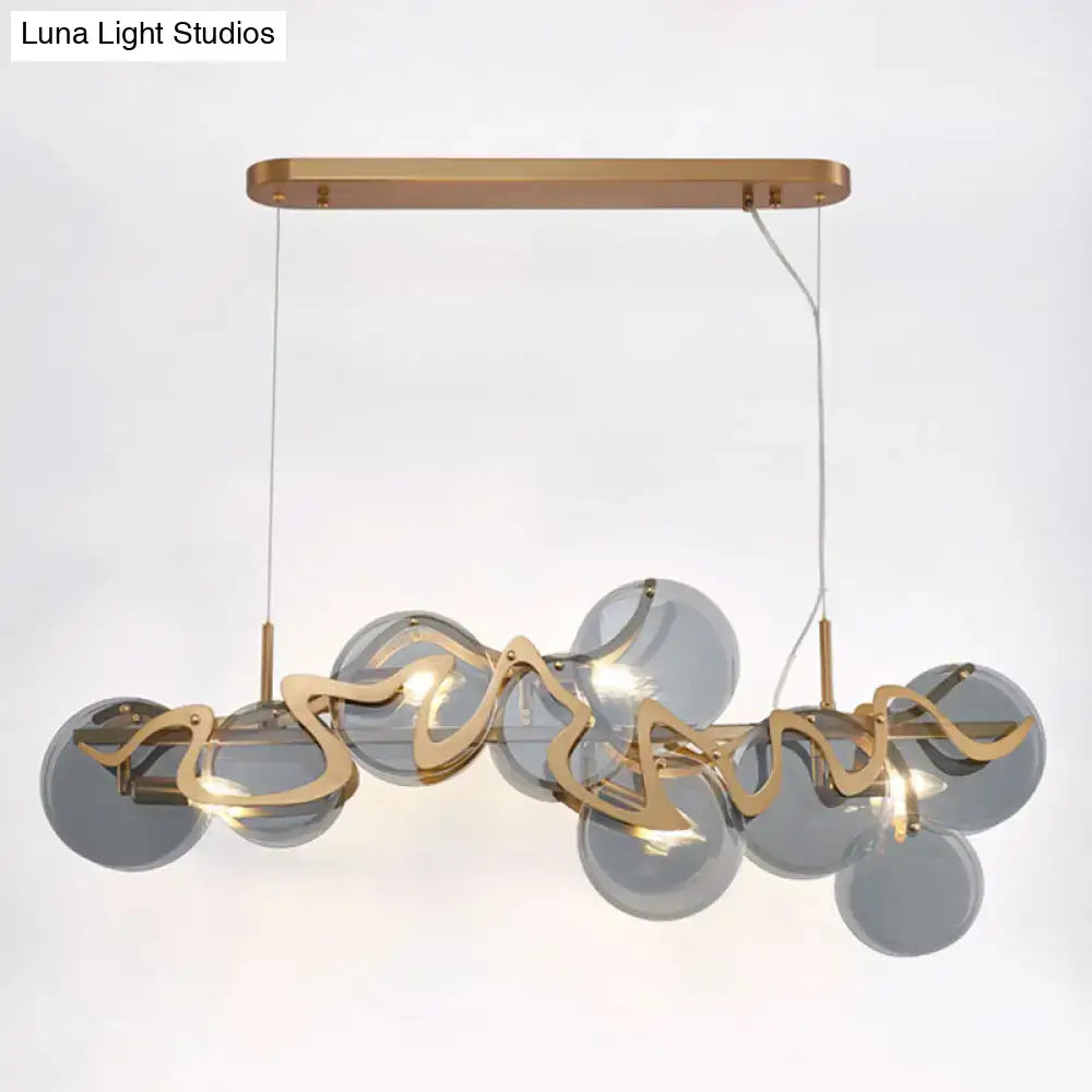 Decorbites postmodern circle pendant light with gold-toned metal and gray glass spheres modern led light fixture