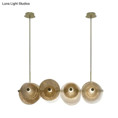 Gold-toned brass decorbites postmodern disc pendant light with four textured glass shades for 110v-120v or 220v-240v use