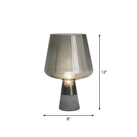 DecorBites postmodern glass table light with smoke gray translucent shade and cement base featuring metallic accent band