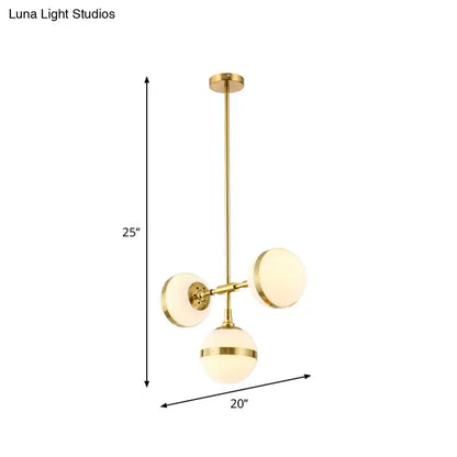 Decorbites postmodern gold branch pendant light with three frosted white ball glass shades in a modern design