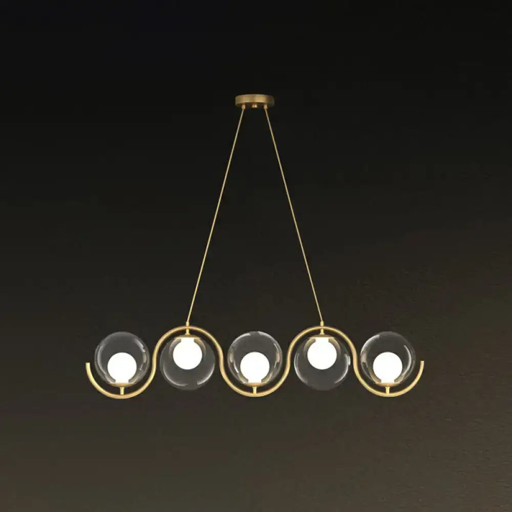 DecorBites™ postmodern hanging lamp with gold-toned frame and clear glass shade featuring five suspended spheres