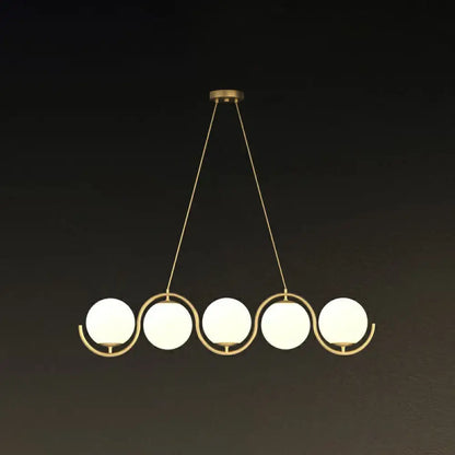 Gold-toned DecorBites™ postmodern hanging lamp with clear milk white glass shade and five frosted globe lights suspended by chains