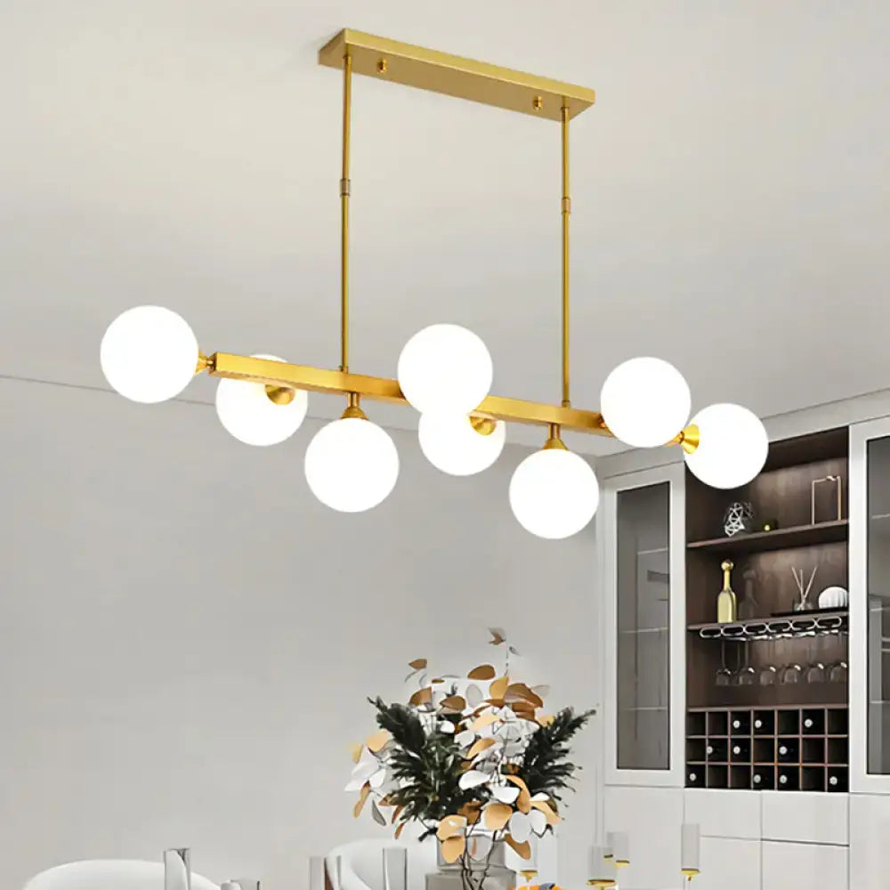 DecorBites postmodern gold-toned pendant light with six opaline glass molecular bulbs for dining room island illumination