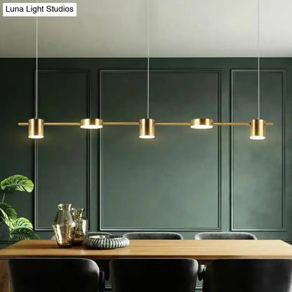 Modern gold-toned straight bar led ceiling light with five cylindrical bulbs for kitchen island by DecorBites™