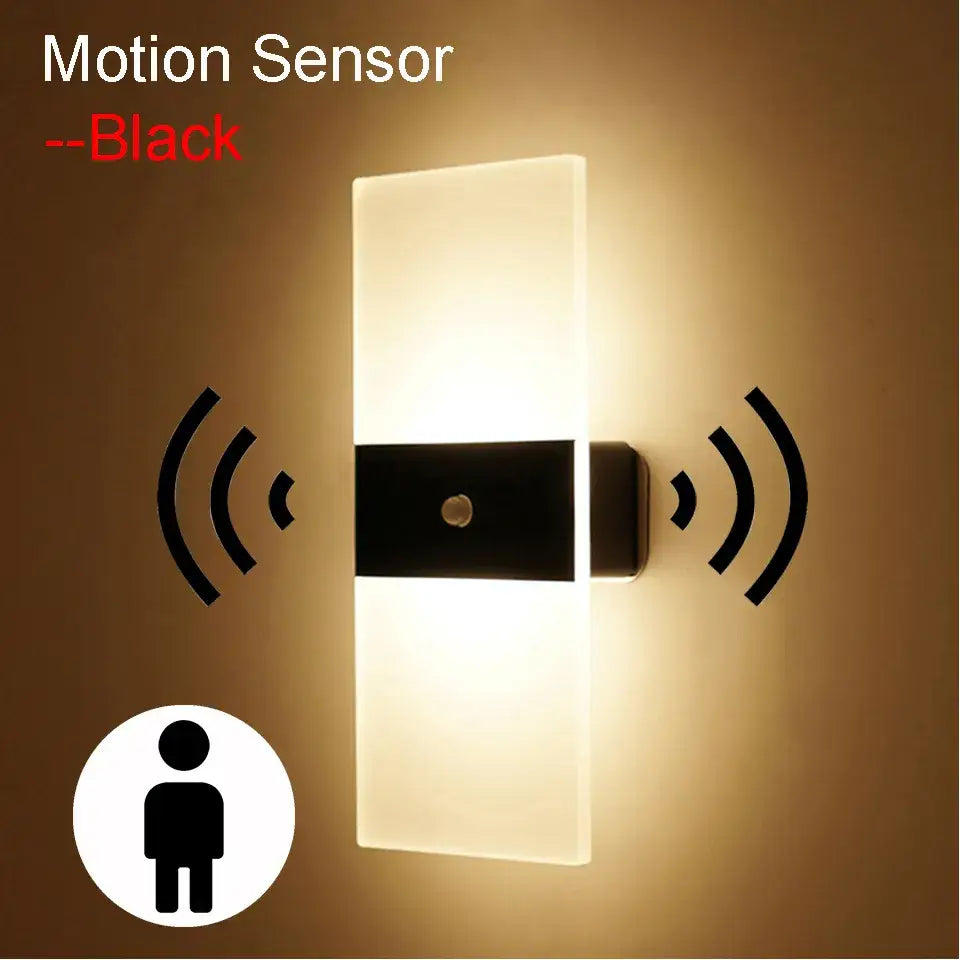 Decorbites™ rechargeable dimmable wall light by rikard is a black motion sensor wall light with frosted glass panels for battery operated wall use