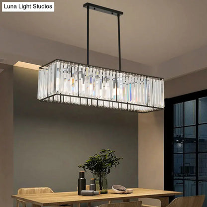 Rectangular clear crystal island pendant light with black metal frame for dining room by DecorBites™
