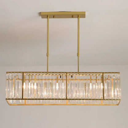 Gold-finished DecorBites rectangular clear crystal island pendant light with vertical rods for dining room suspension lighting