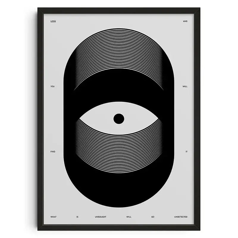 Black-framed decorbites™ retro abstract canvas print with stylized white concentric eye on light gray background