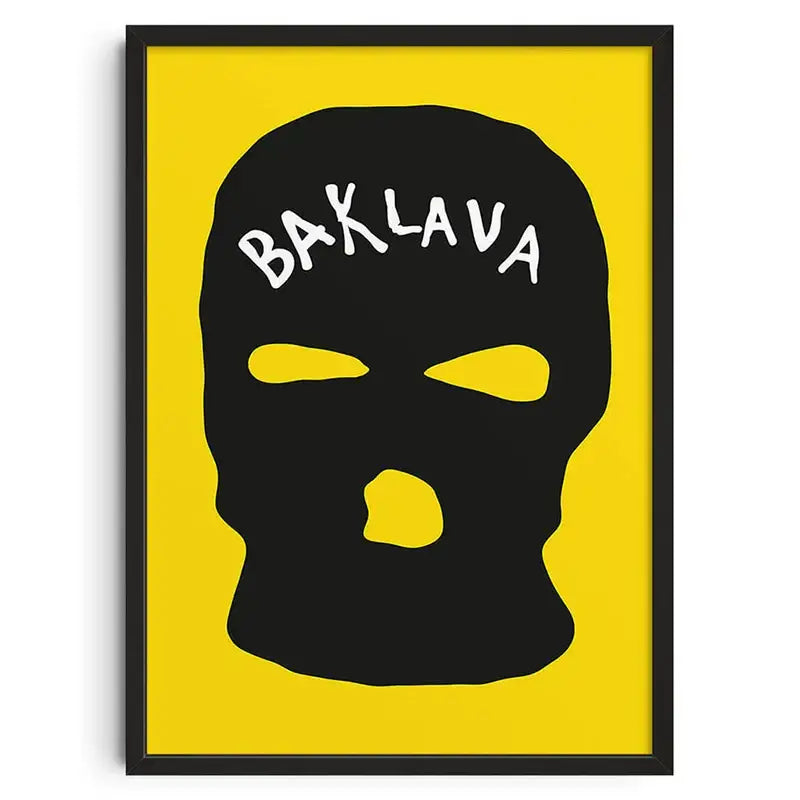 DecorBites™ retro abstract canvas print featuring a black ski mask with yellow cutouts in a sleek black frame
