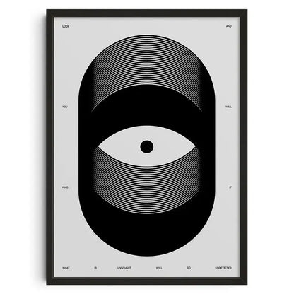 Black framed canvas print featuring a retro abstract stylized eye design with text on a gray background wall art by decorbites