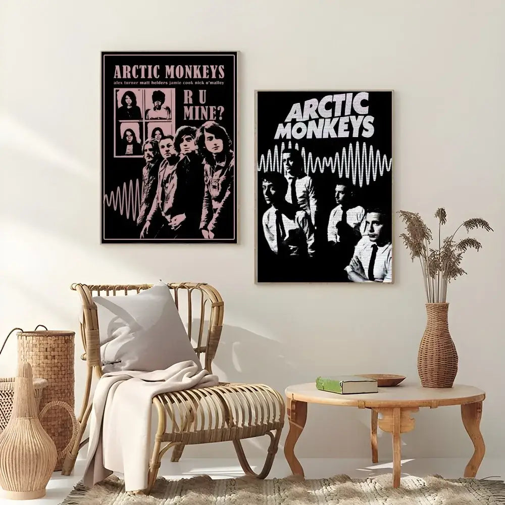Two framed retro arctic monkeys wall art posters featuring black and white waveform and pink-toned portraits