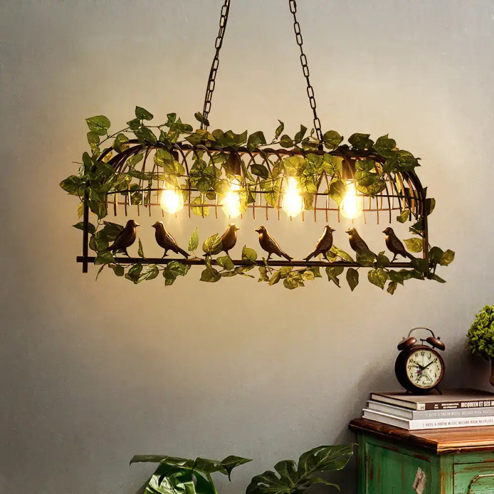 Wrought iron retro birdcage island light fixture with green vines and birds featuring warm led bulbs in black metal frame