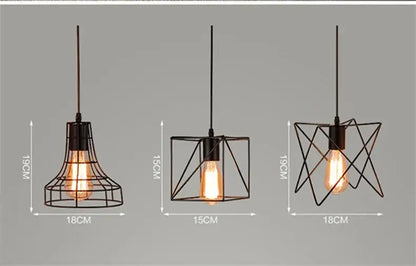 Three black iron art pendant lights with geometric cages and exposed edison bulbs retro iron art design
