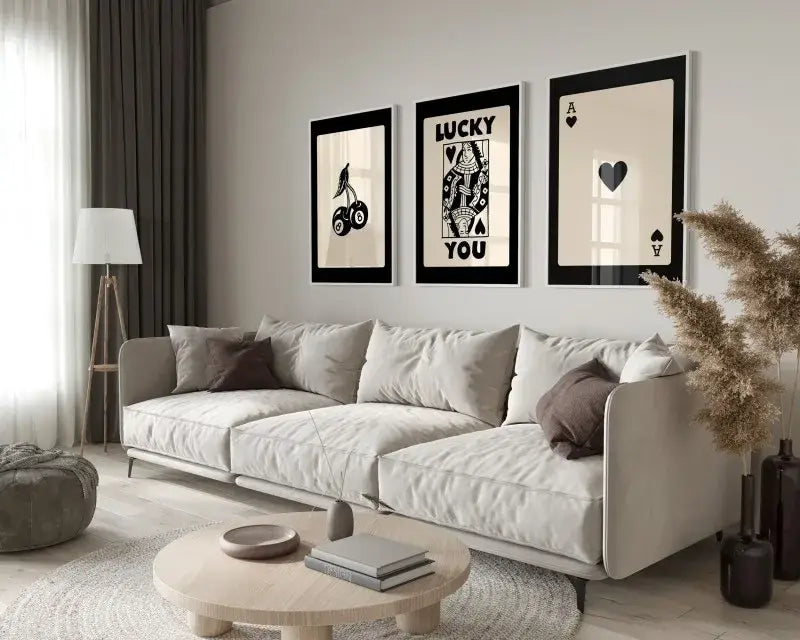 Beige upholstered sectional sofa with soft modern design and dark brown pillows in decorbites retro lucky aesthetic posters set queen of hearts