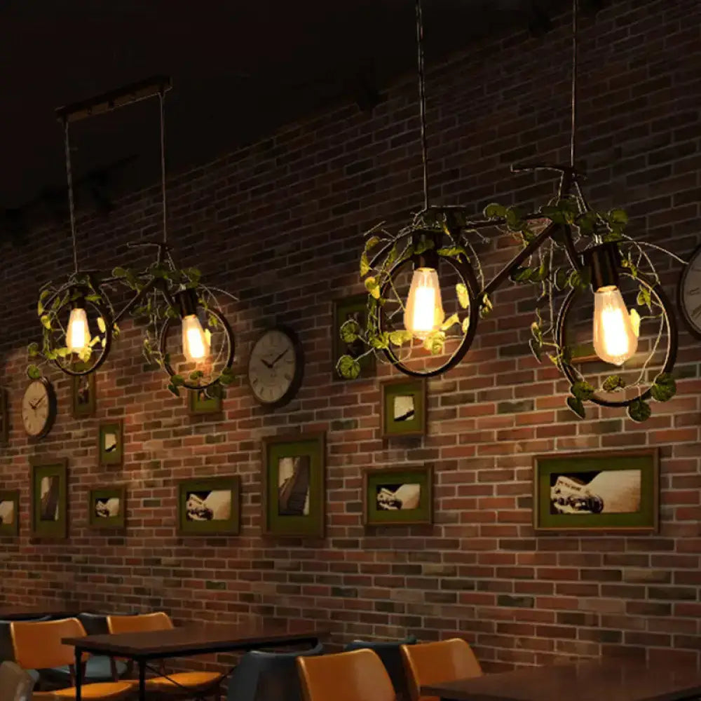 DecorBites™ retro metal bicycle restaurant ceiling light with black wrought iron frames, exposed bulbs, and plant decor