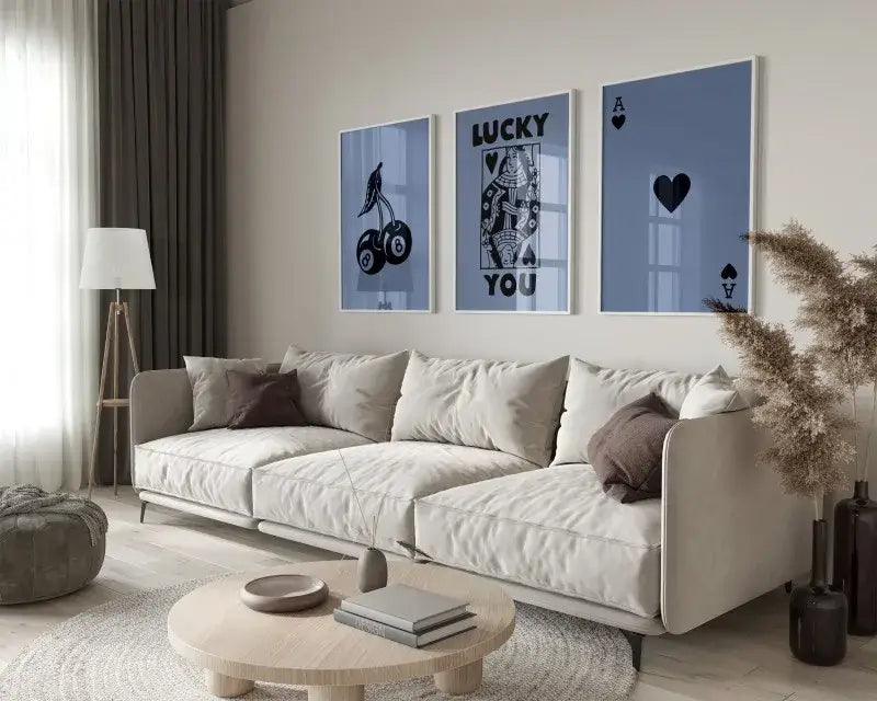 Beige upholstered sectional sofa with dark brown accent pillows complements decorbites™ retro queen of hearts wall art set posters