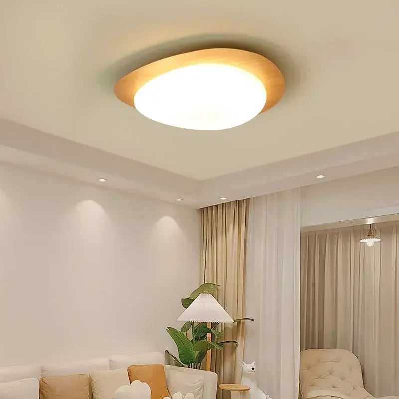 Decorbites™ retro-style oval ceiling light with warm walnut color wooden frame and soft white illuminated center for living room