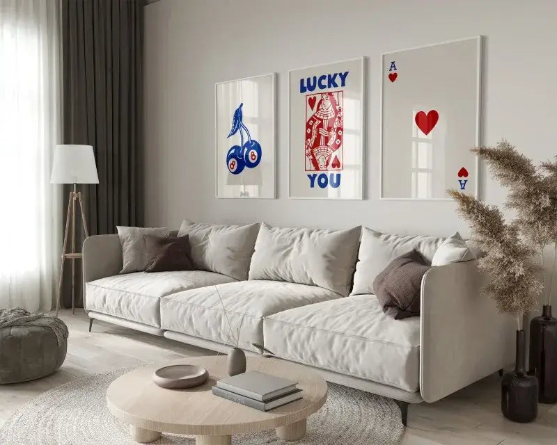 Beige upholstered sectional sofa with modern design and dark brown pillows beside decorbites™ retro wall art posters set queen of hearts theme