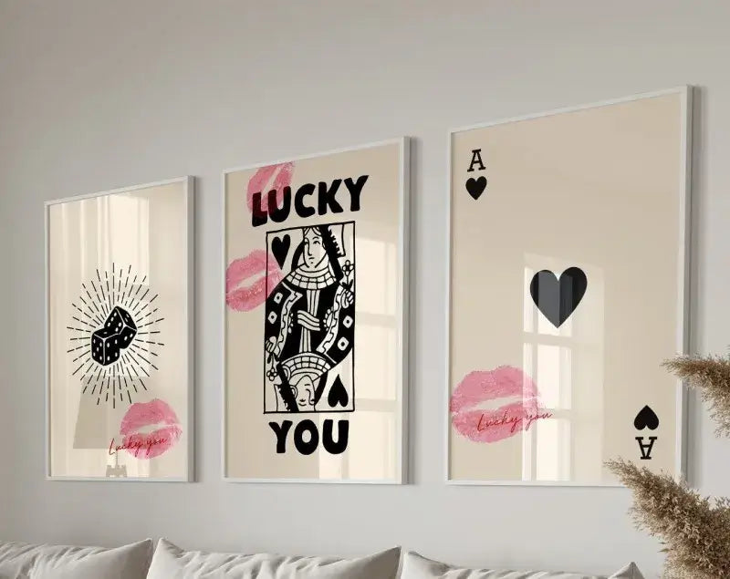 Three framed decorbites™ retro wall art posters featuring black and pink poker-themed designs on a cream background