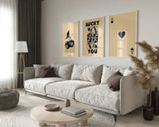 Beige modern sectional sofa with plush cushions and dark brown accent pillows paired with decorbites™ retro wall art set queen of hearts theme