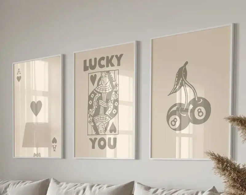 Three framed wall art prints from decorbites retro wall art set featuring queen of hearts theme with beige and gray design