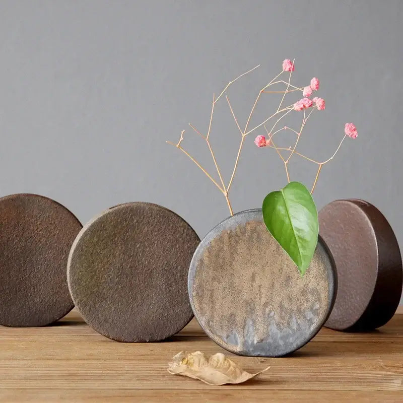 Decorbites™ retro zen pottery vase ornaments with mottled brown gray glaze holding pink dried flowers and green leaf for tea ceremony