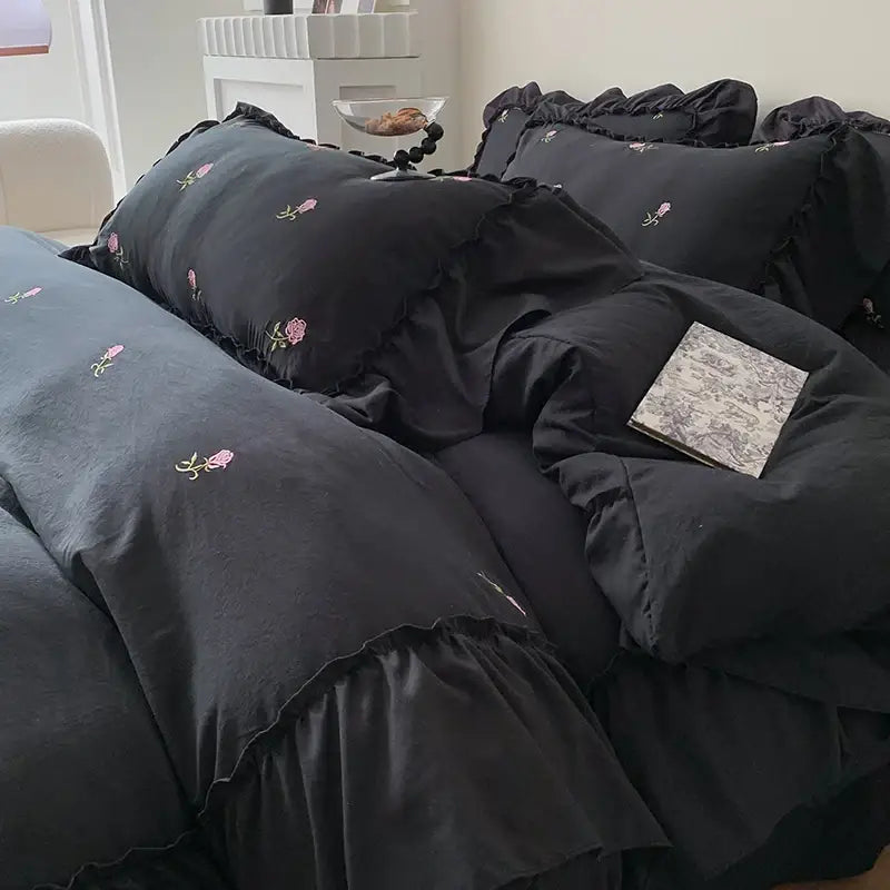 Decorbites™ rose embroidered duvet cover set in black with delicate pink rose embroidery and ruffled princess style detailing