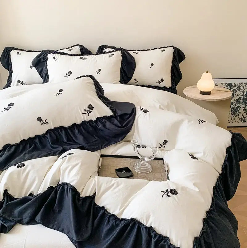 Decorbites™ rose embroidered duvet cover set in white and navy blue with ruffles and black rose embroidery princess style