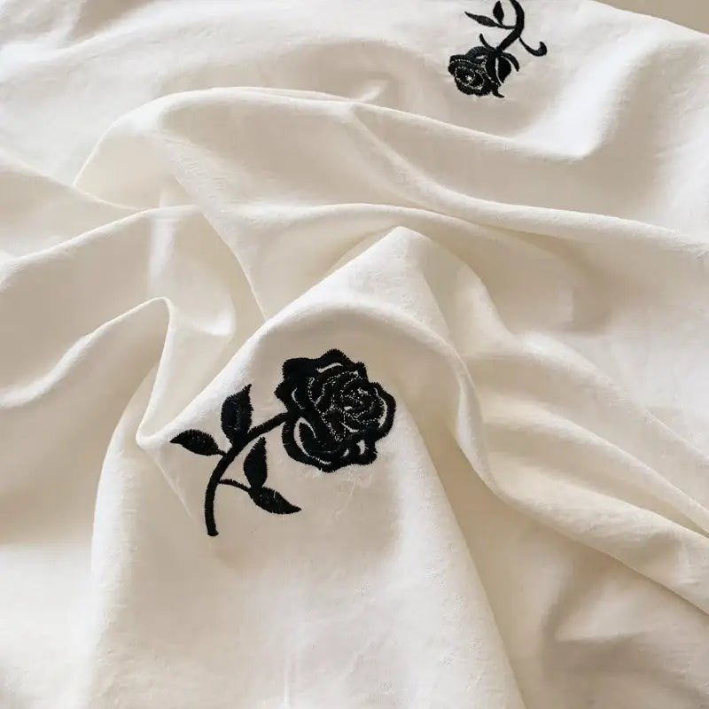 White fabric rose embroidered duvet set with black embroidered roses from decorbites princess style collection
