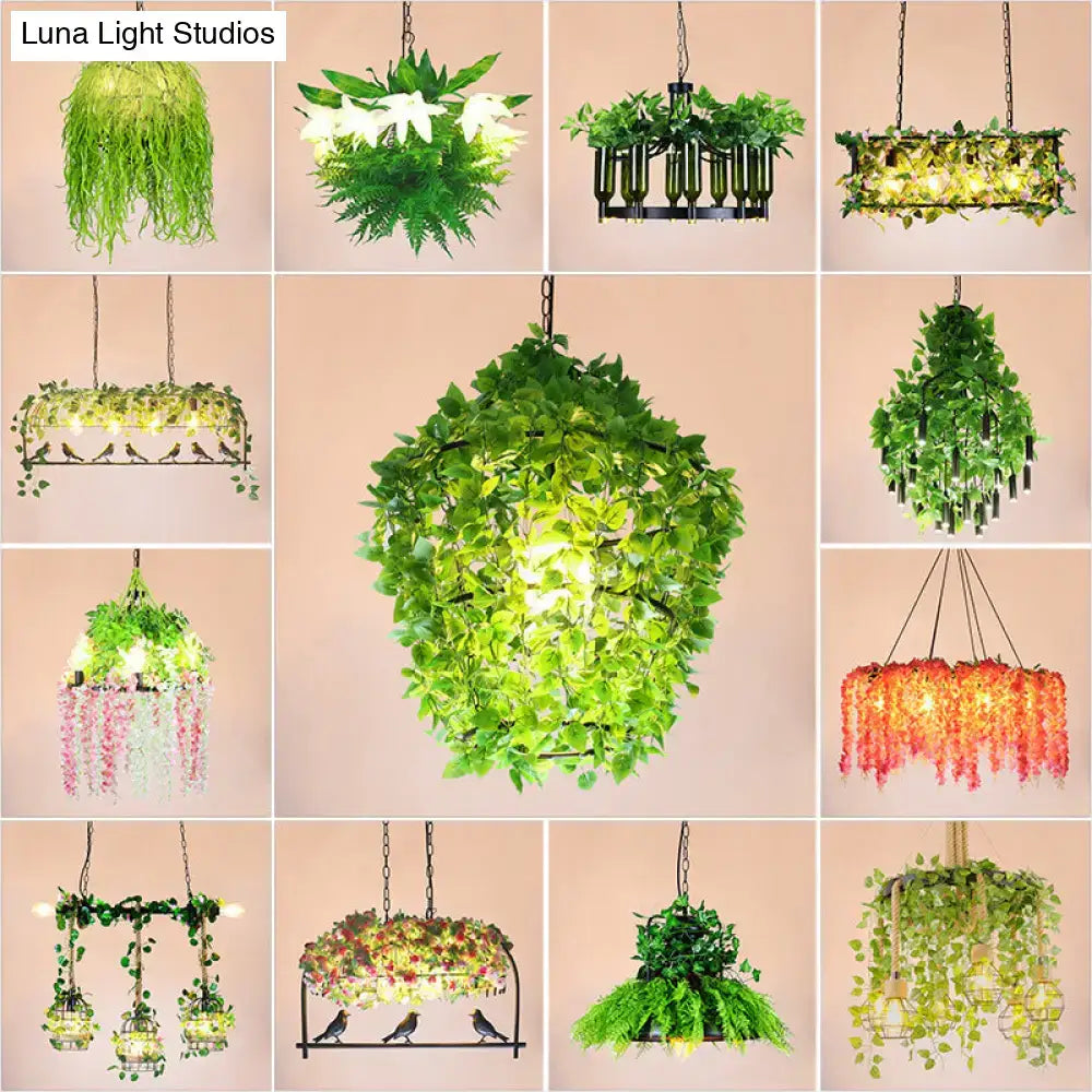 Decorbites™ rustic black metal island pendant light featuring a green leafy hanging chandelier with central light source