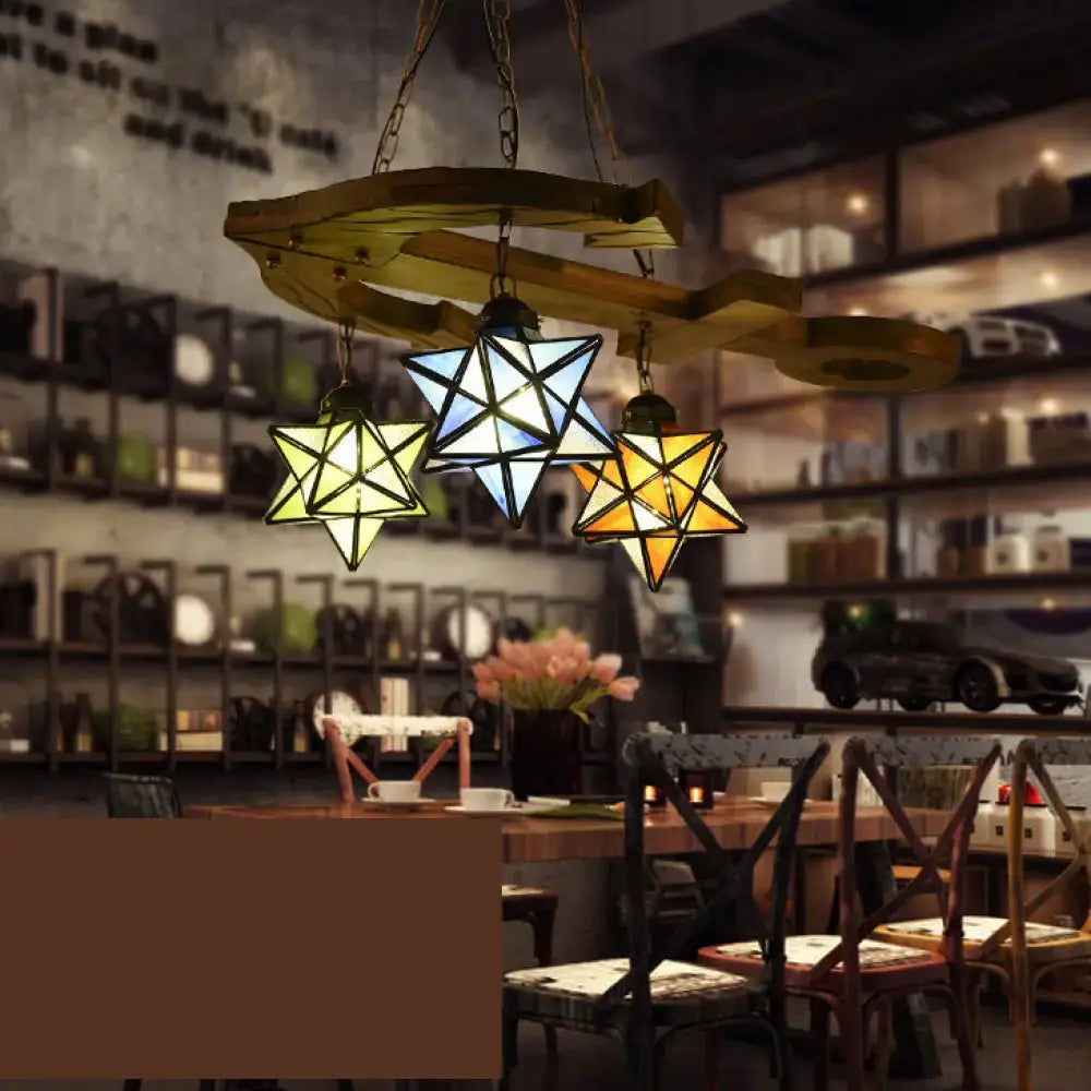 DecorBites rustic black star hanging chandelier with three yellow blue amber glass shades and anchored metal chain hanging lamp