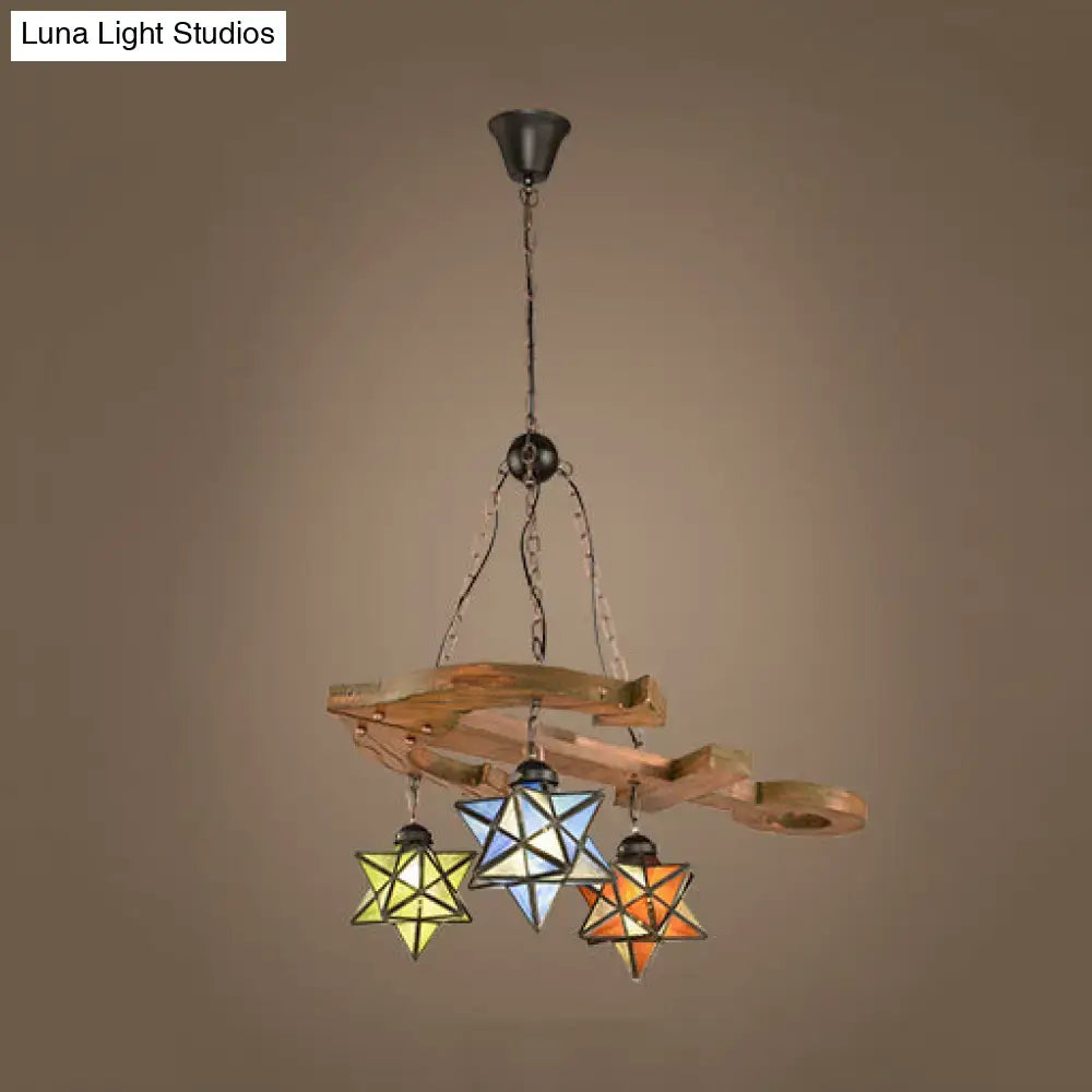 DecorBites rustic black star hanging chandelier with adjustable glass shades and metal chain featuring yellow blue and orange pendants