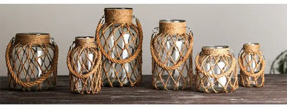 Set of six DecorBites rustic hanging glass vases with mesh detailing and woven natural twine hemp rope handles