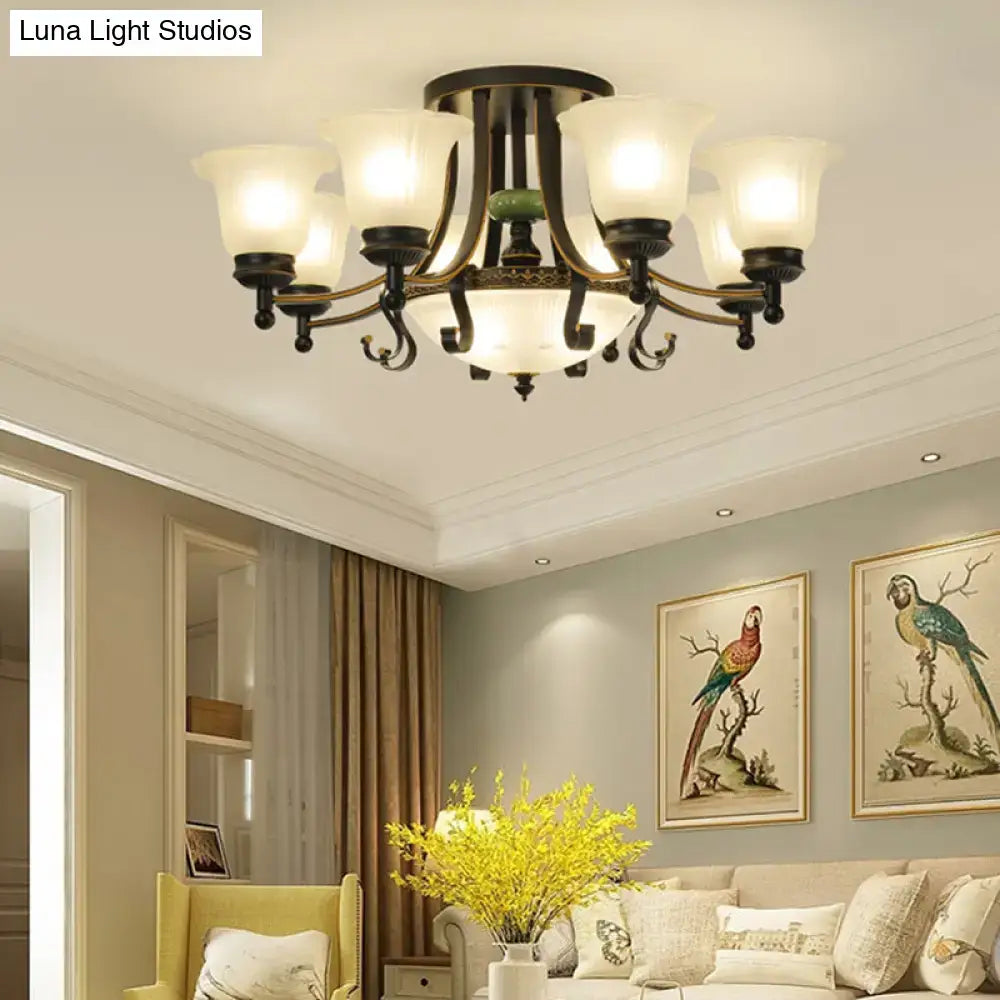 Antique bronze-finished DecorBites™ ceiling light fixture with five frosted glass shades and green accent