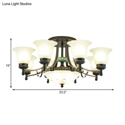 Antique brass ceiling light fixture with six frosted opal glass shades and central green accent for living room