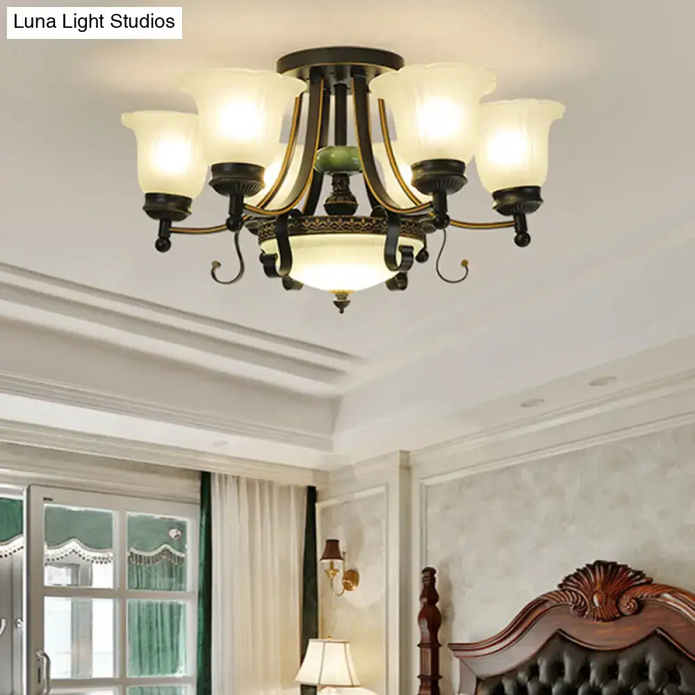 Antique bronze-finished decorbites ceiling light fixture with six frosted glass shades and central oval light for living room