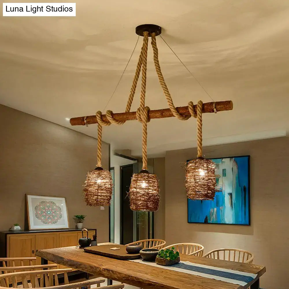 Rustic wooden beam chandelier with three woven rattan pendant lights suspended by natural rope for dining room hanging light fixture